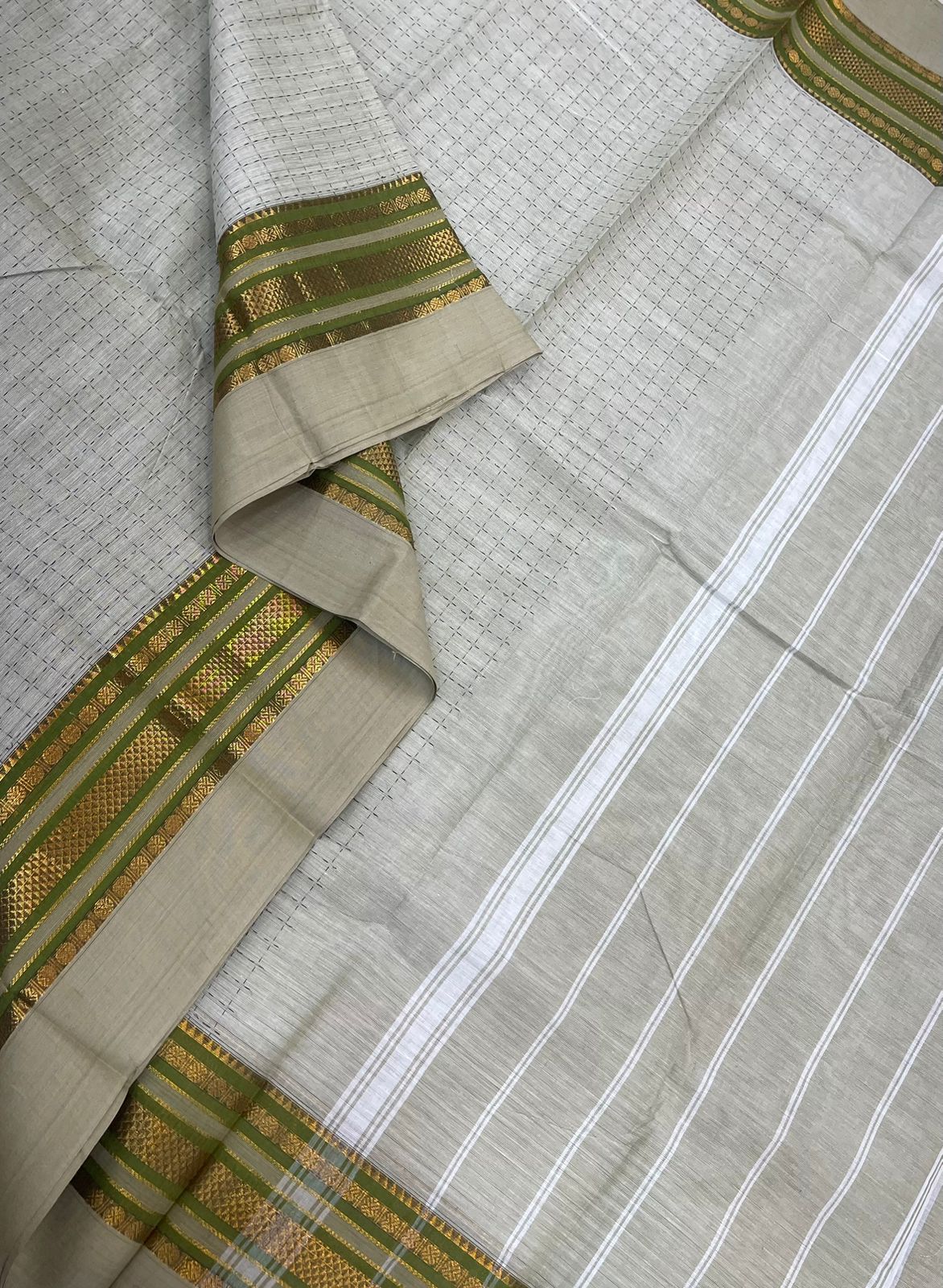 Kanchi soft cotton |zari border X plus BUTTA| half white x green