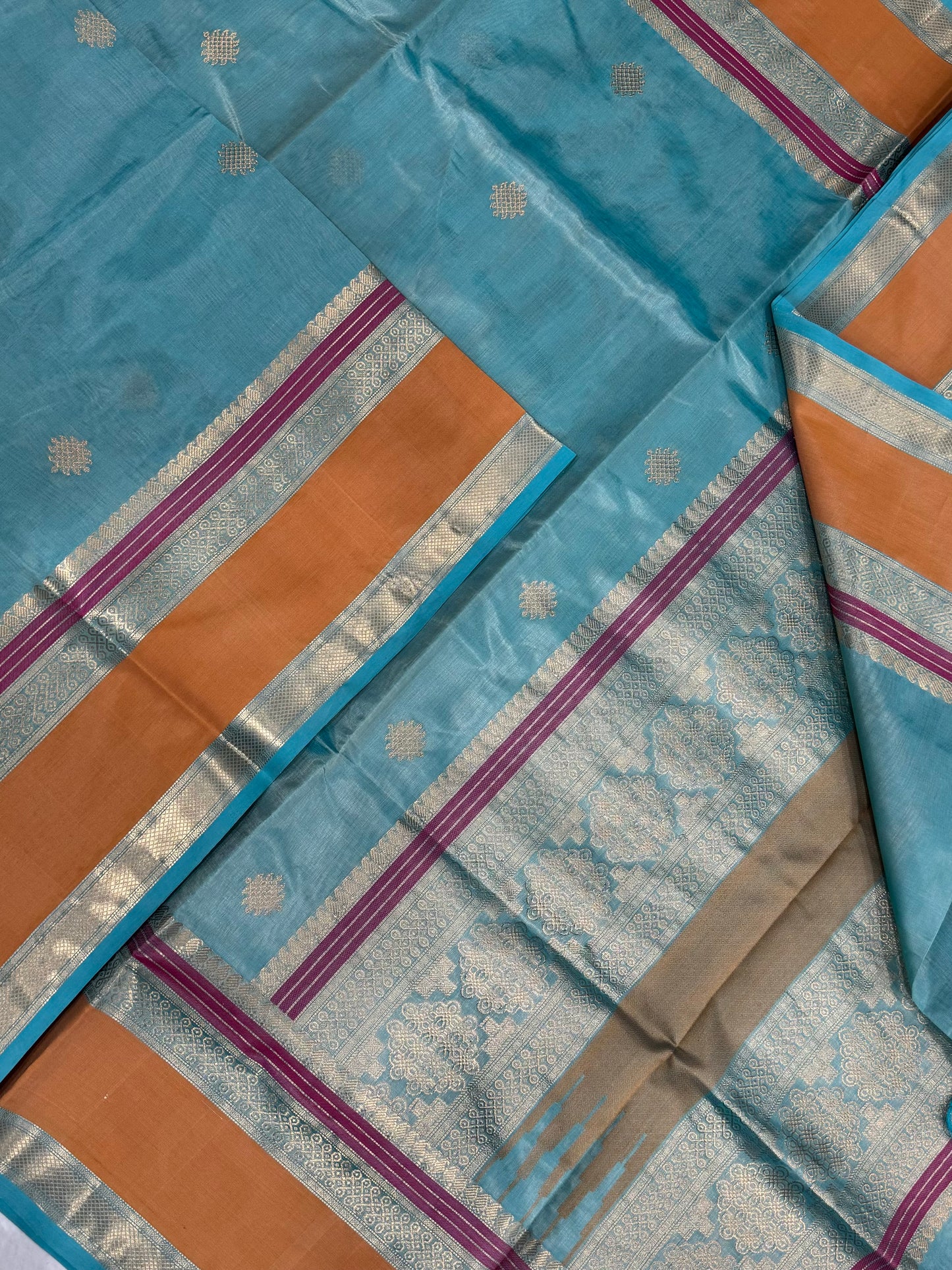 Kanchi Silk Cotton Sarees | kolam motifs | pastel blue X mustard
