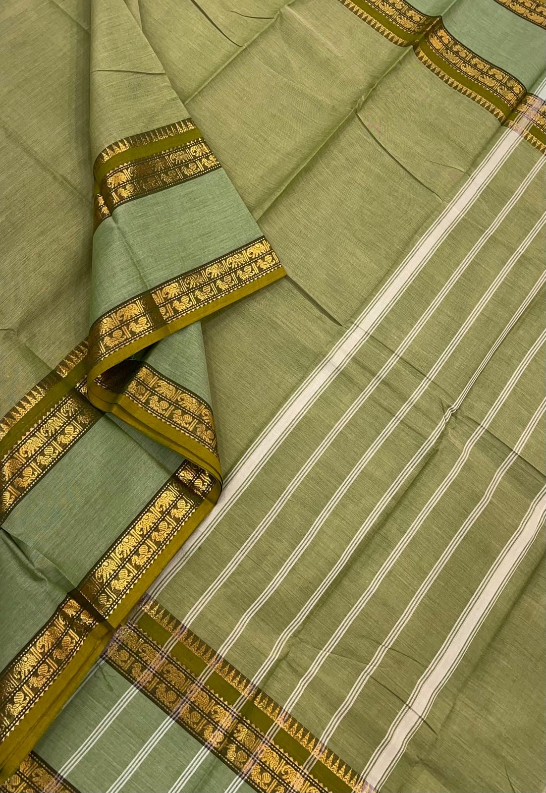 Kanchi soft cotton | earth green  | rettaipet zari border